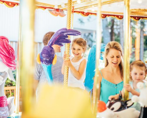 family-on-the-looney-tunes-carousel-ride-at-movie-world